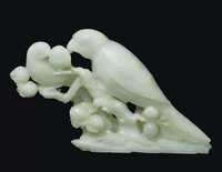18TH CENTURY A PALE CELADON JADE CARVING OF A PARROT GROUP